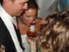 Marjans sisters feeding the bride and groom with a spoonful of honey